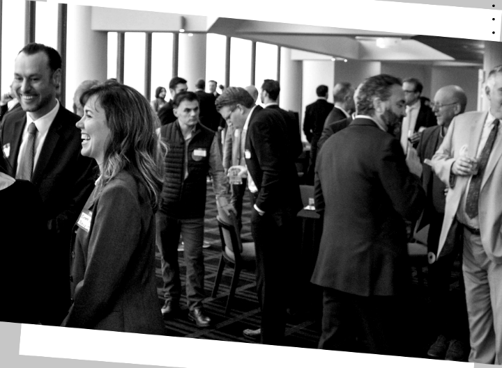 Attendees in conversation at an EFOGI-produced event